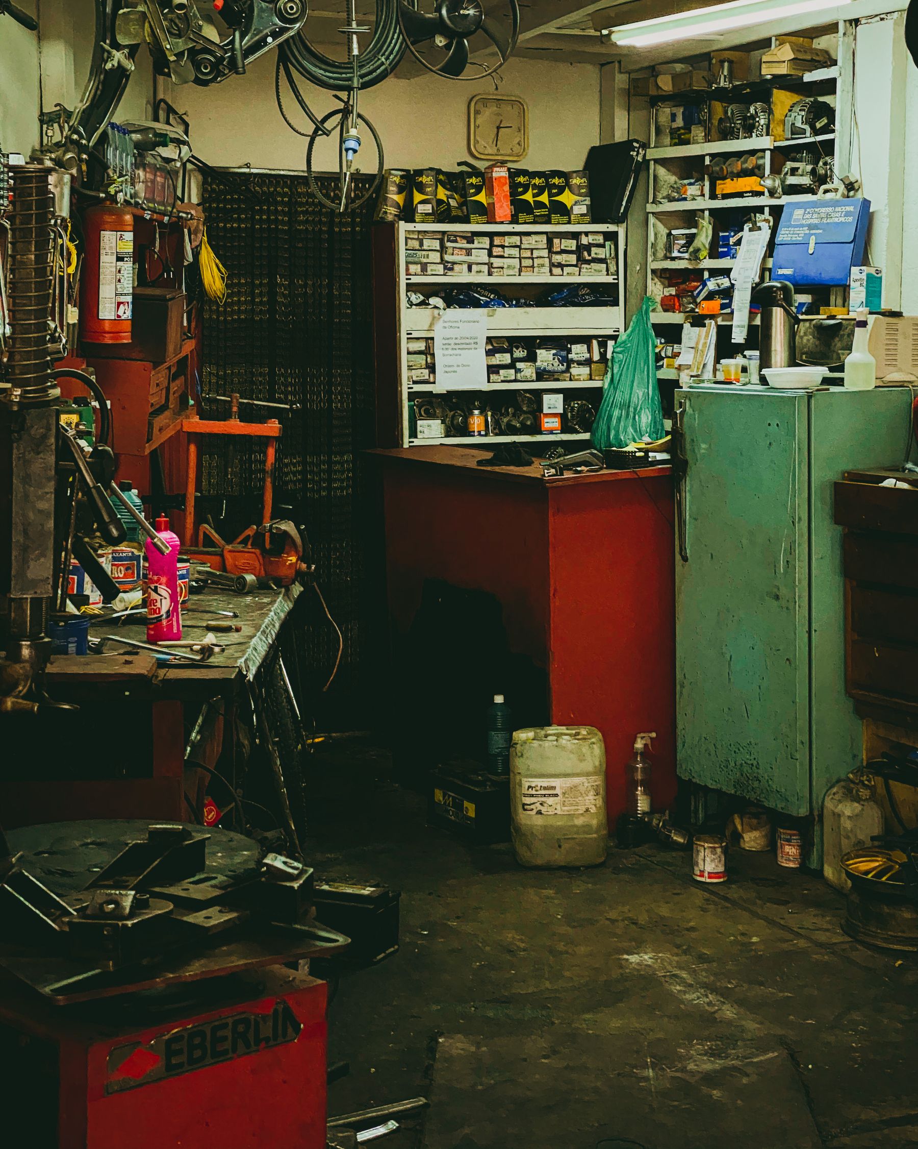 Cluttered garage before a full property cleanout